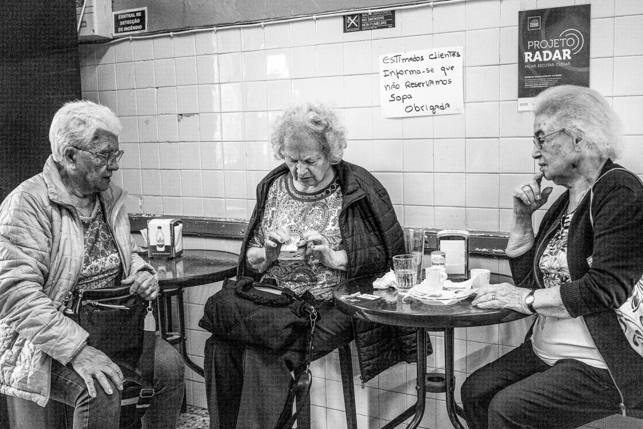 Lisbon street photography guide 4 Locals in Lisbon enjoying a coffee