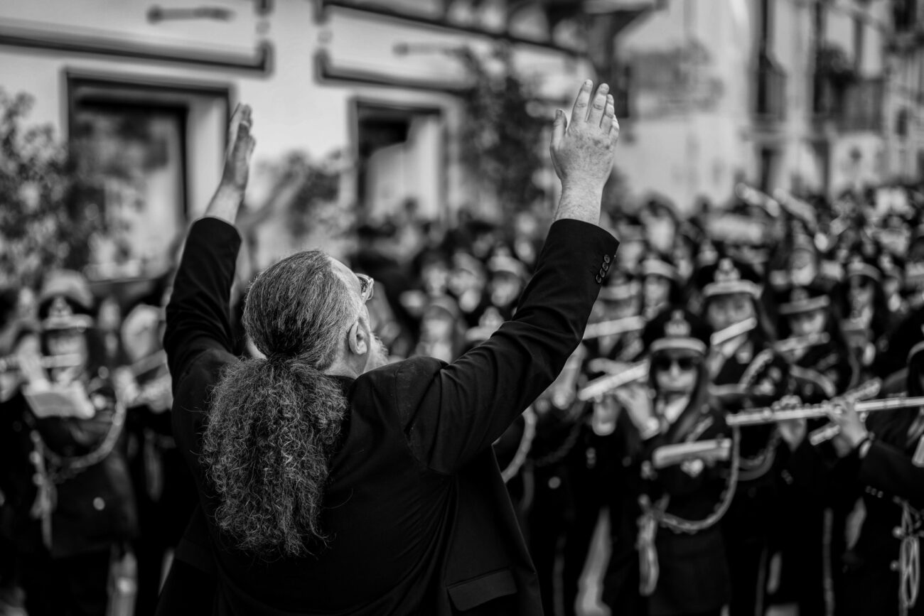 Inside the Misteri di Trapani: Documenting Sicily’s Living Tradition 17 The conductor leads one of the brass bands during the Misteri di Trapani procession in Trapani, Sicily.