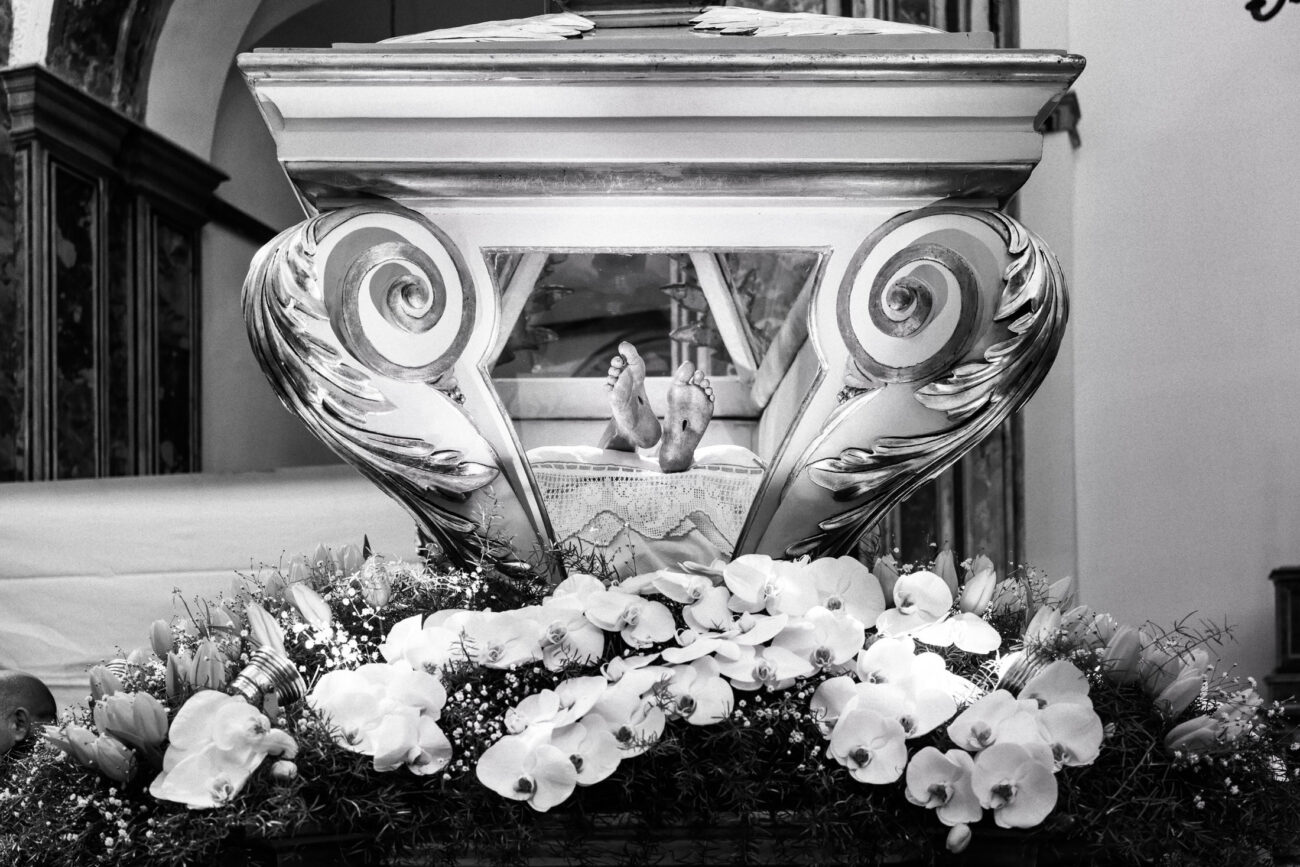 Inside the Misteri di Trapani: Documenting Sicily’s Living Tradition 7 The sacred group depicting Christ lying in a glass coffin inside the Church of the Anime Sante before the Misteri di Trapani procession in Trapani, Sicily.