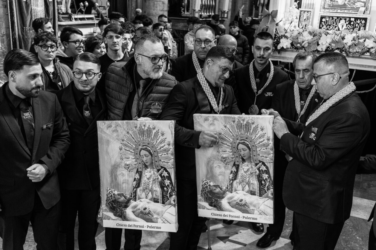 Inside the Misteri di Trapani: Documenting Sicily’s Living Tradition 9 The hours before the Misteri di Trapani begins are filled with countless small rituals and preparations. Inside the Church of the Anime Sante, members of the Unione Maestranze gather to organise the final details before the sacred groups begin their twenty-four-hour journey through the streets of Trapani.