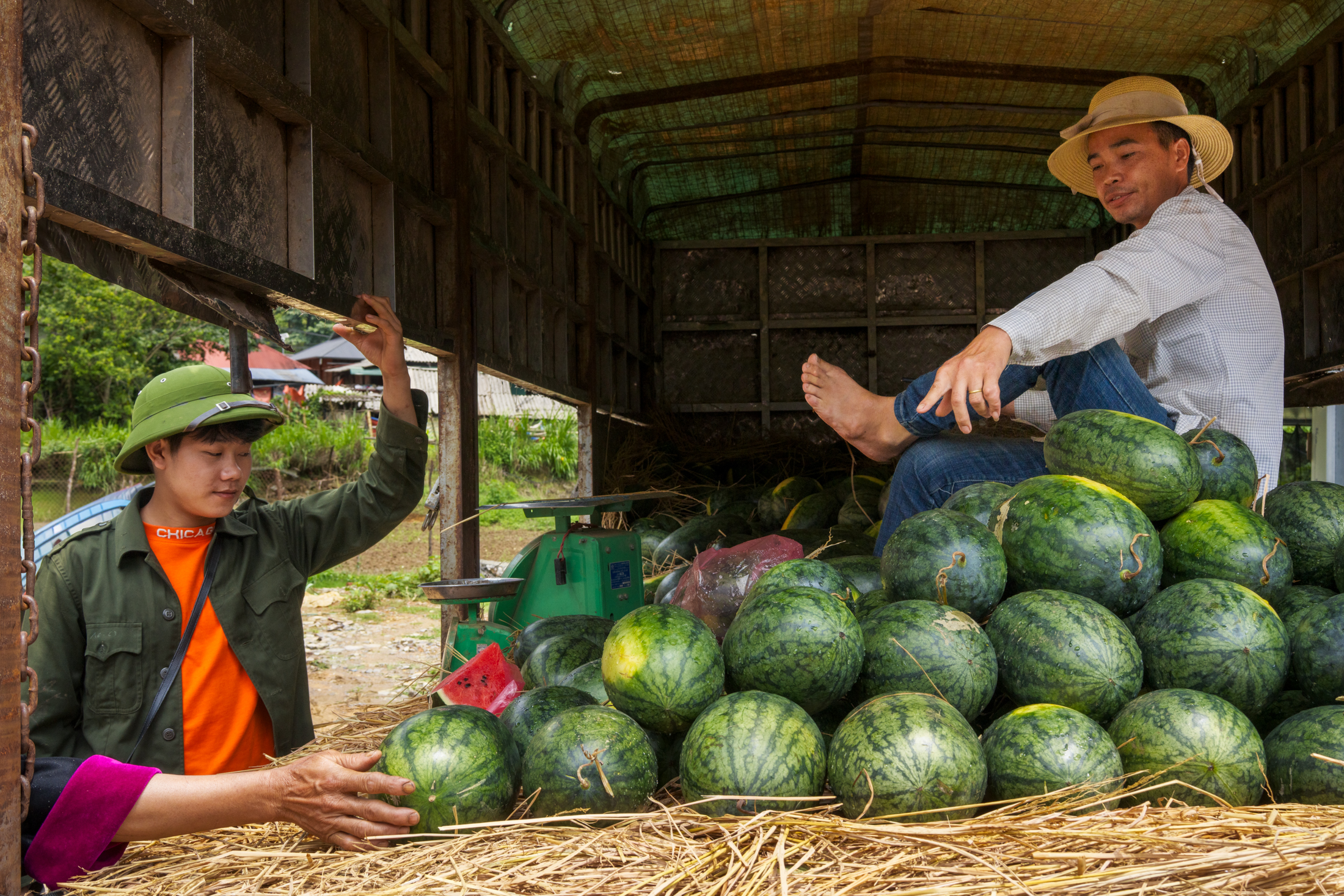 Northern Vietnam Photography: A Photographer’s Journey Beyond the Tourist Trail 15 Traders sell watermelons from the back of a lorry at a roadside market in northern Vietnam.